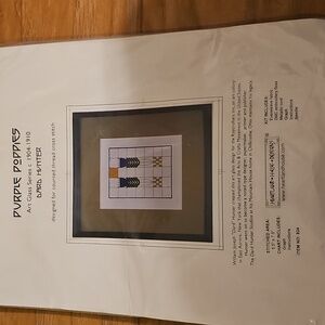 This is a Heartland House Designs "Purple Poppies" cross-stitch kit